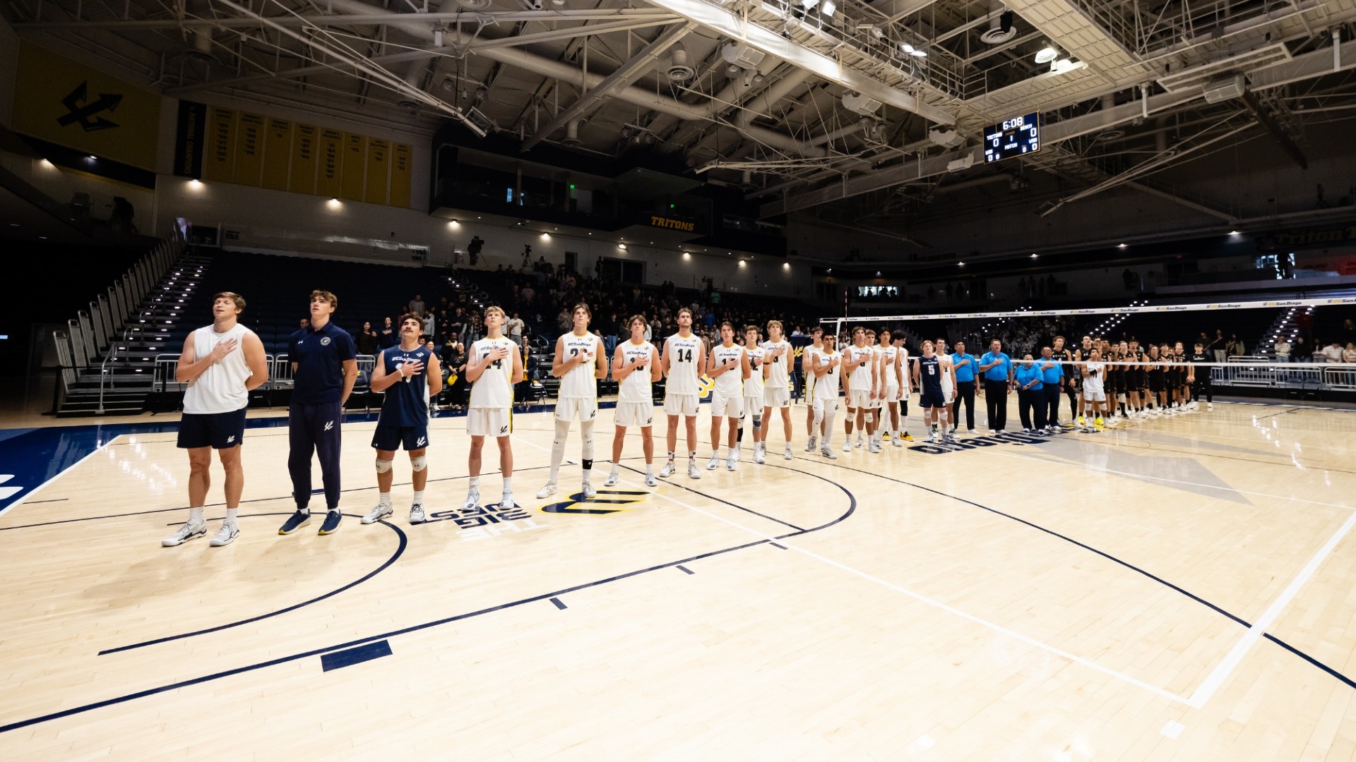 UC San Diego Men's Volleyball standing in a line during the National Anthem