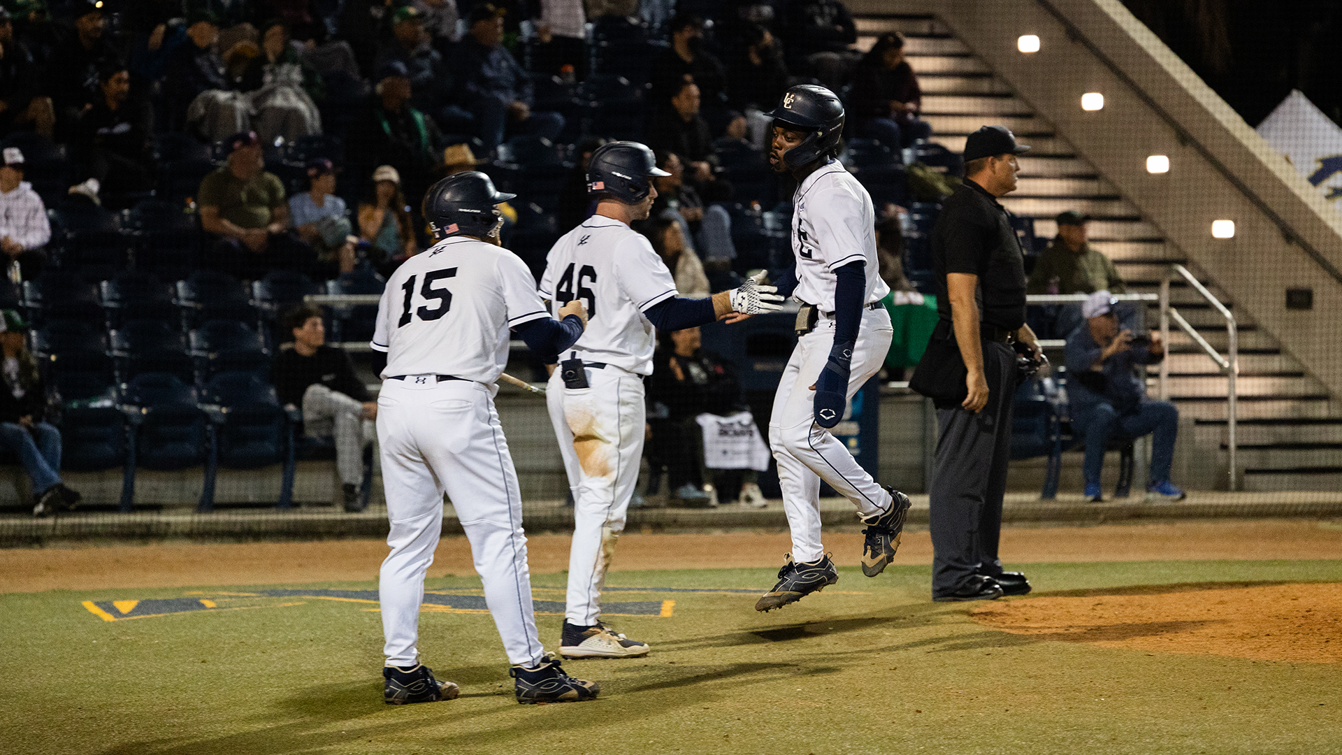 Delshaun Lanier celebrates with teammates at home plate