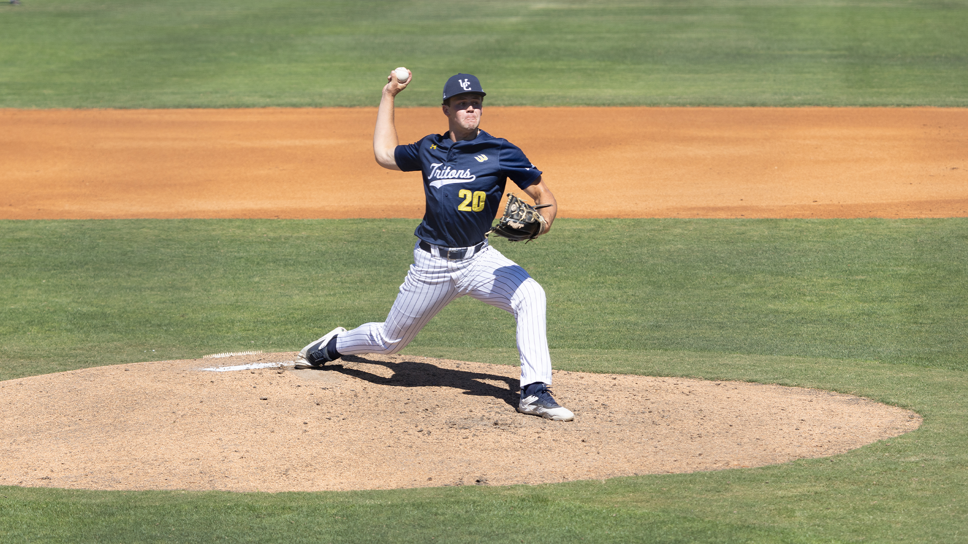Austin Bowker pitches from mound