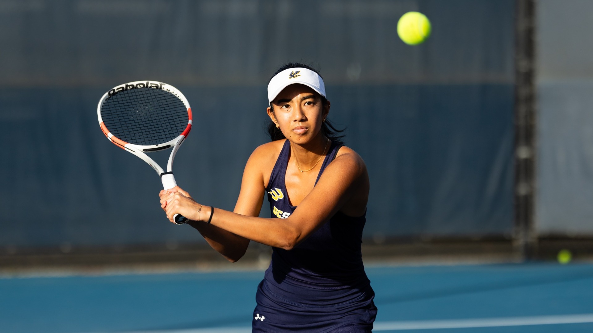 Julia Visaya gets ready to strike the ball for UC San Diego tennis