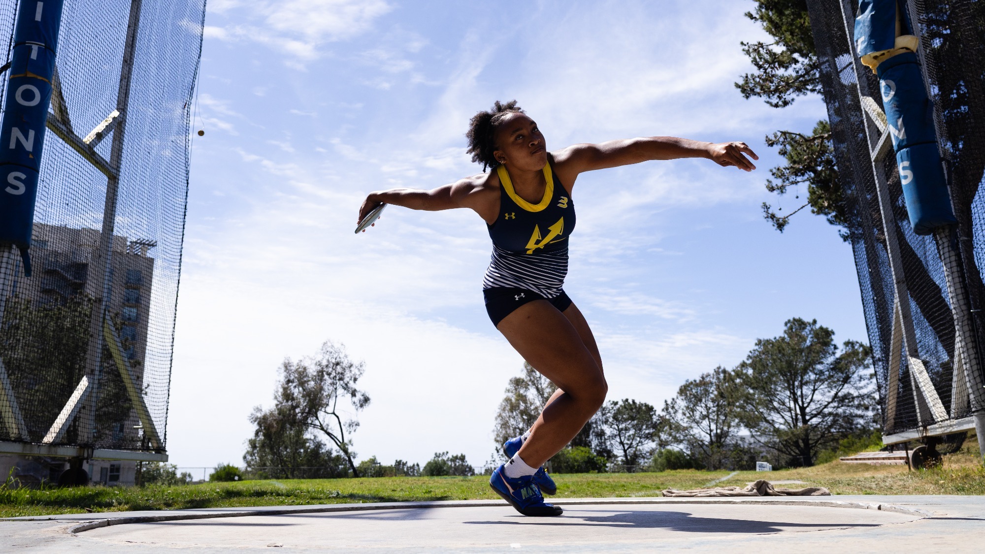 Feyi Olukanni competing in Discus
