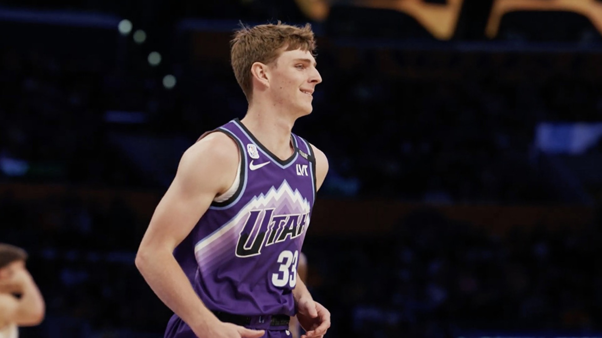 Hayden Gray wears a purple Utah Jazz jersey 