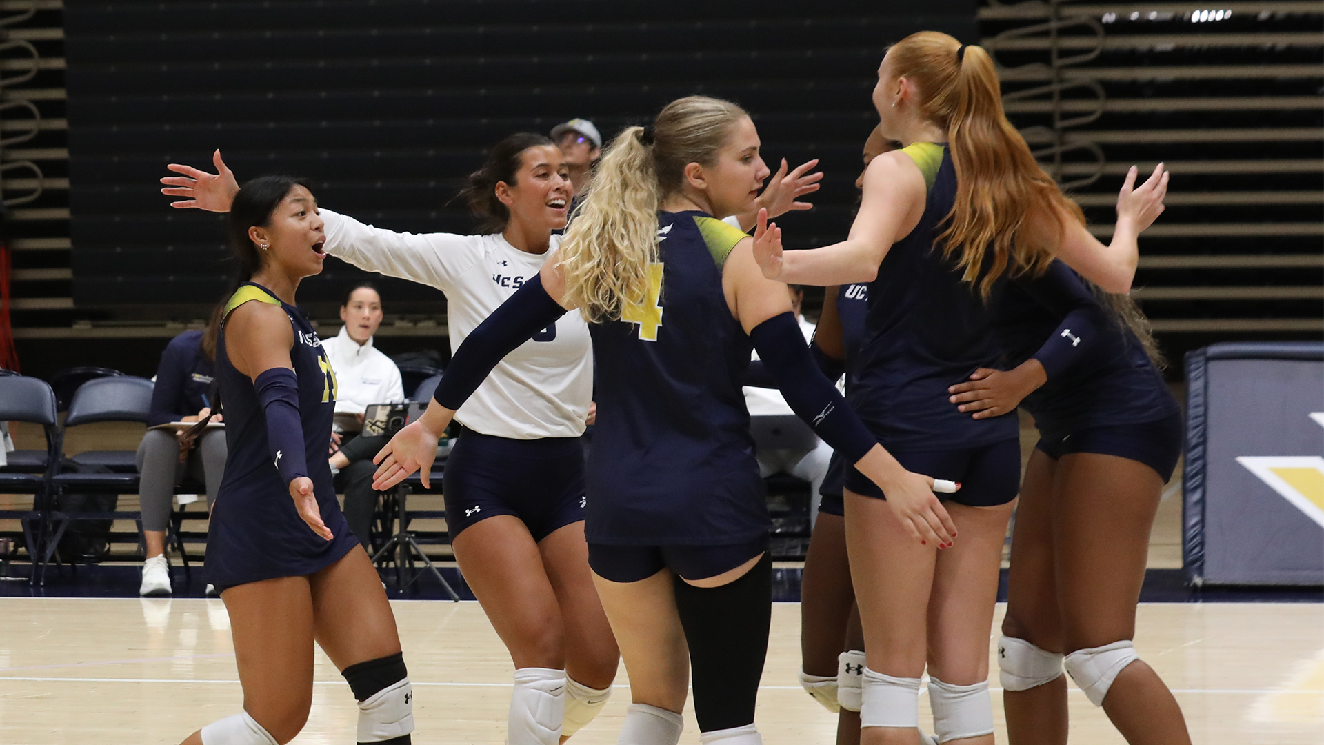 group celebration in center of court