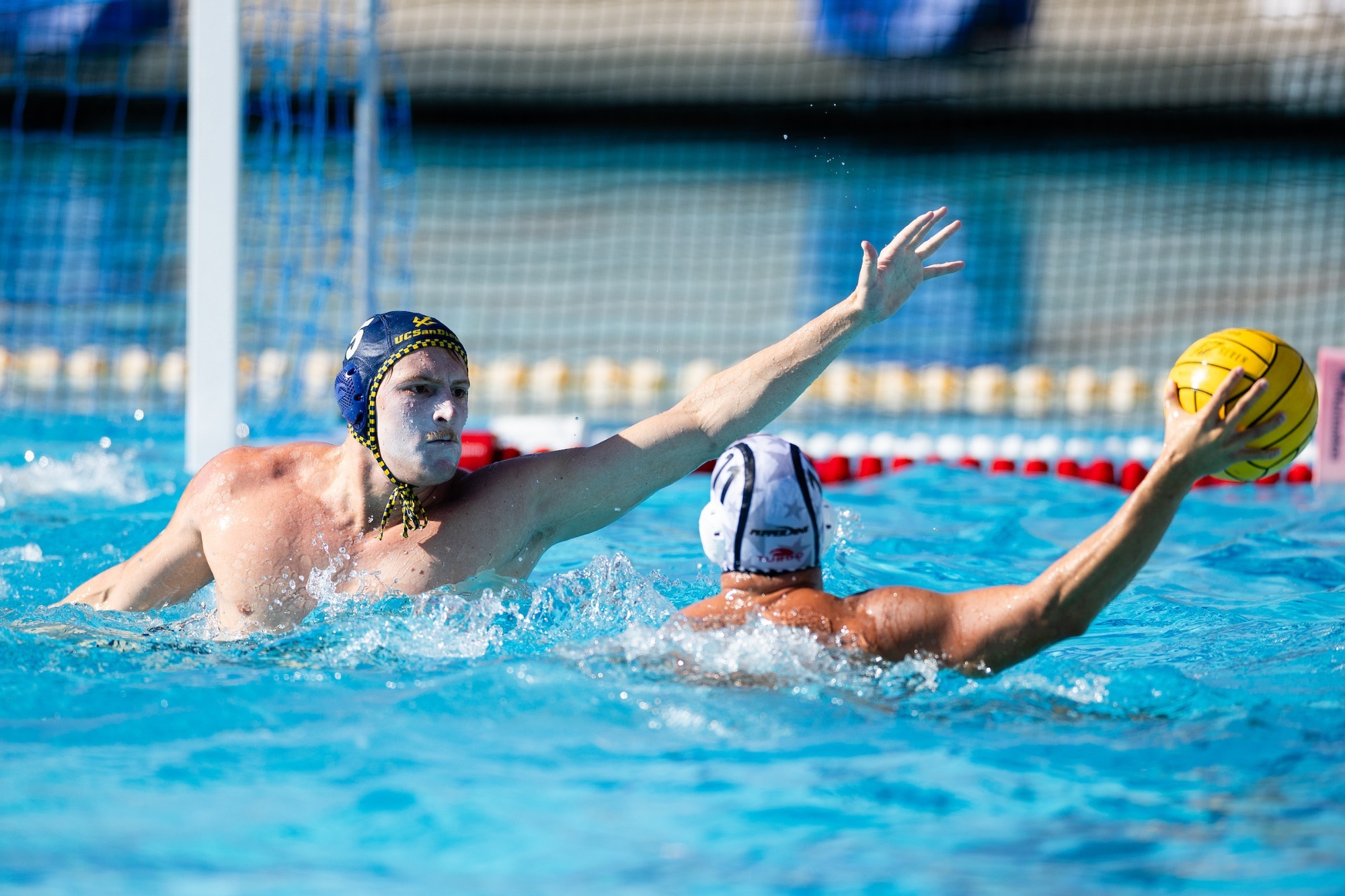 Finn Bugelli playing defense against Pepperdine