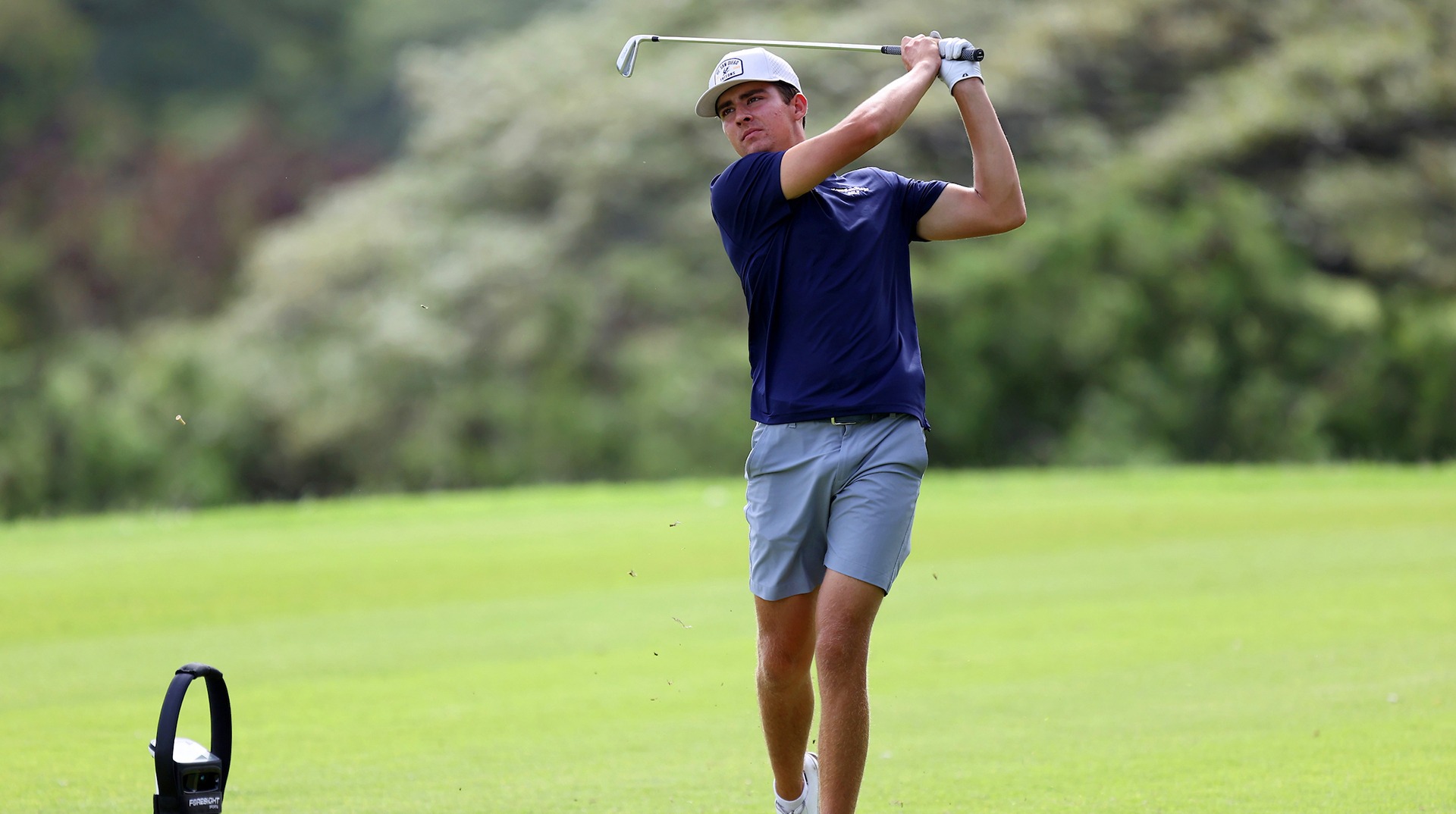 Justin Gill swings away