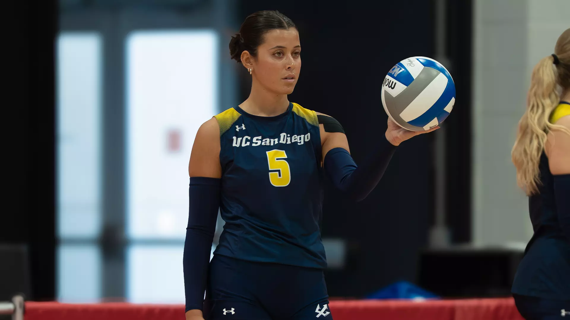 Dillyn Griffin prepares to serve against UNLV