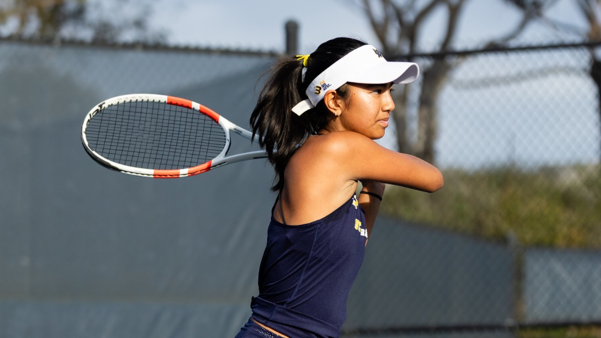 Julia Visaya swing follow through with racquet