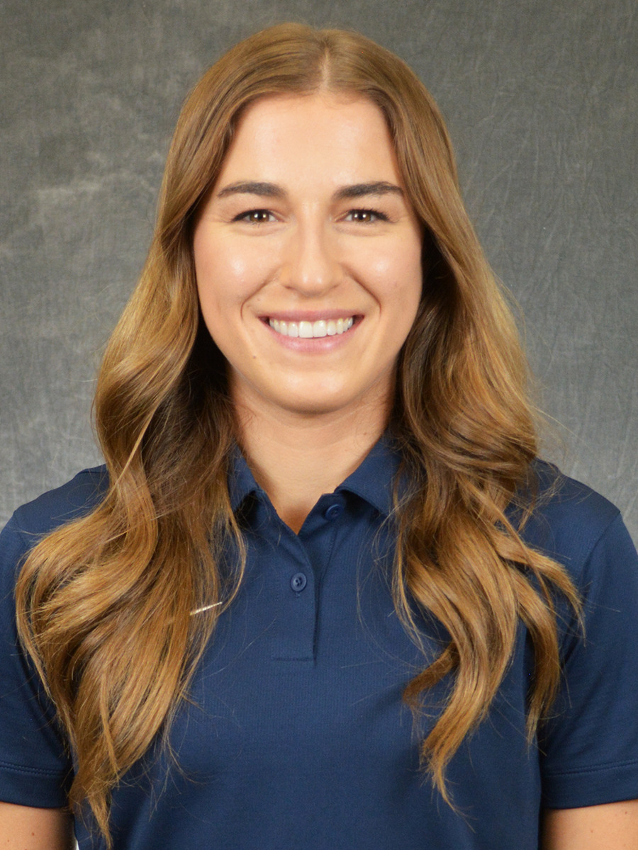 Portrait image of women's golf head coach Ellie Cronin