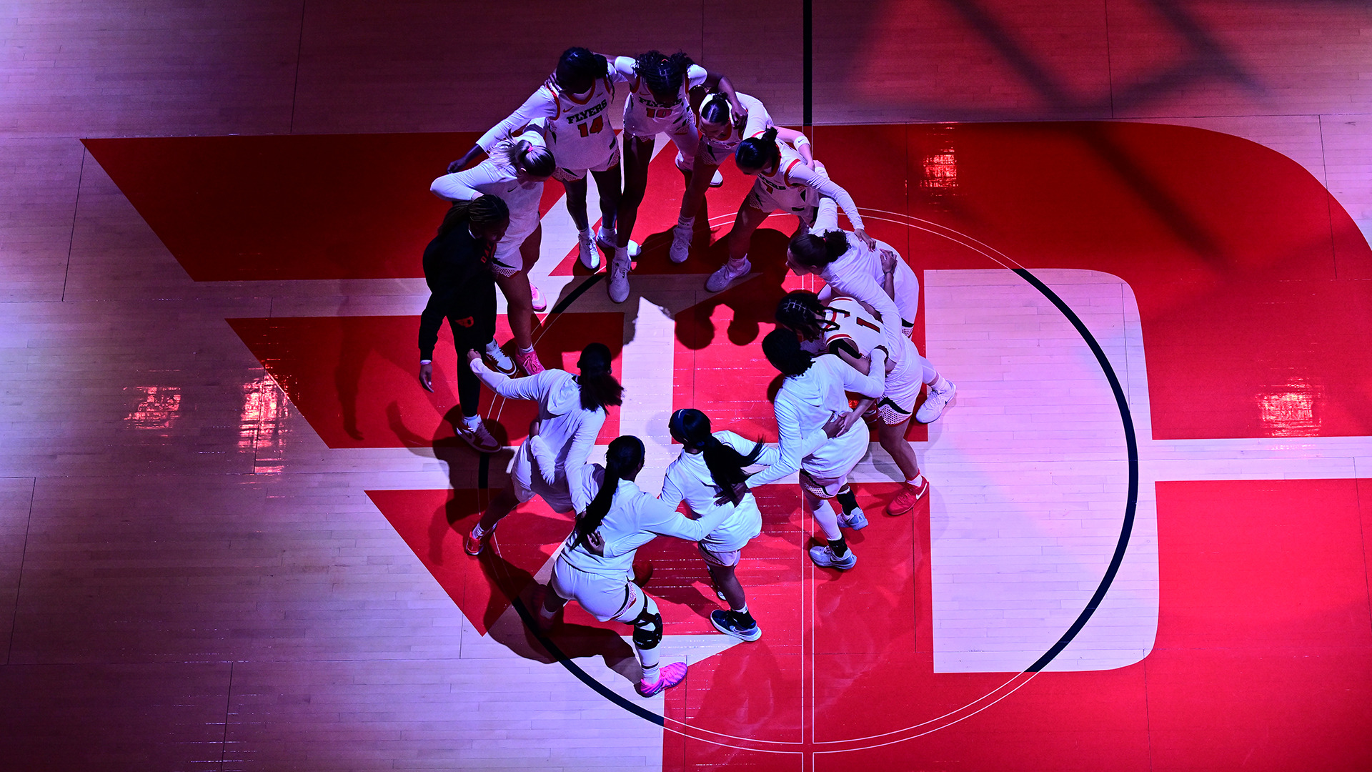 The team before the game huddling up