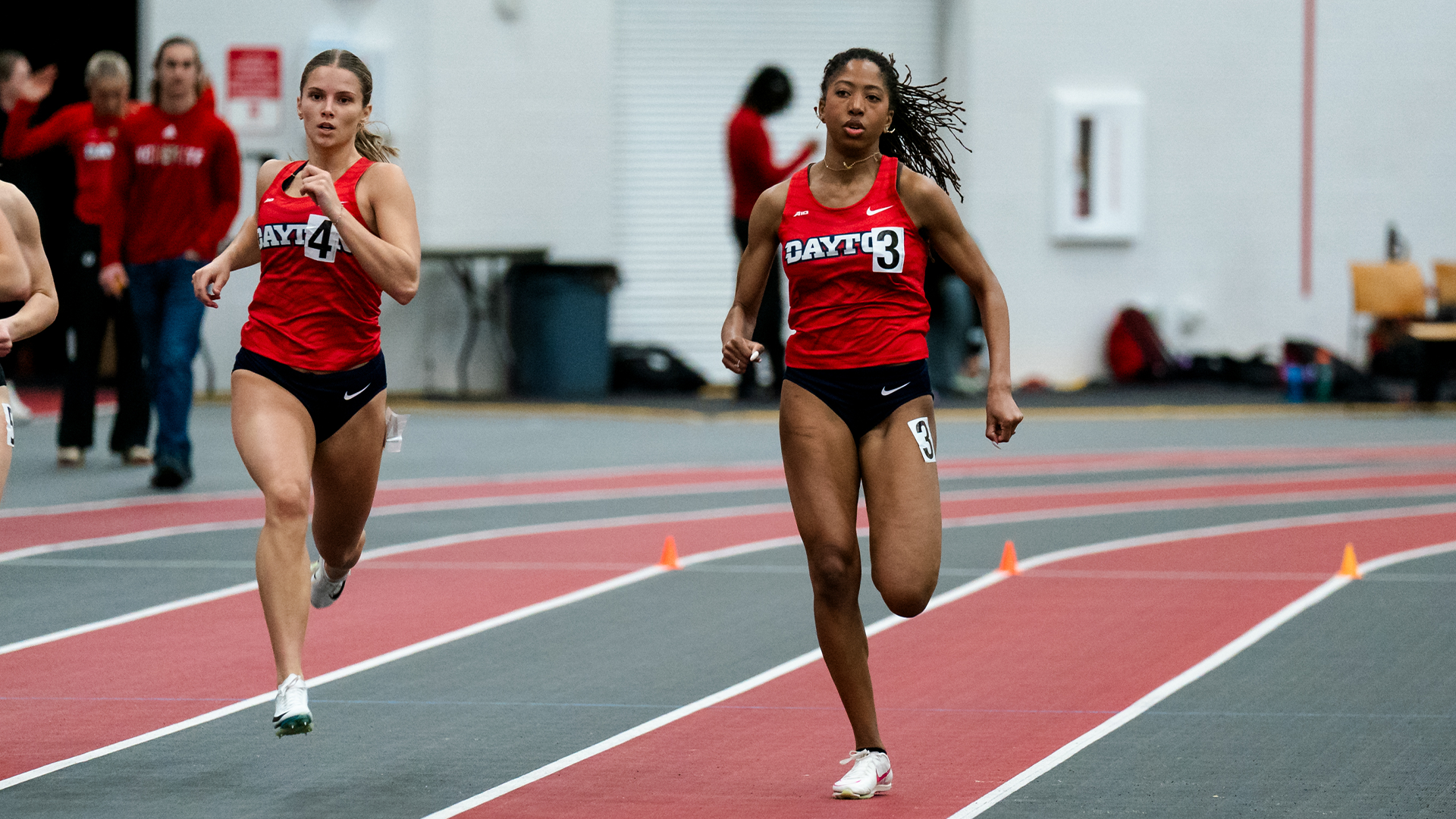 Mariya Washington and Grace Felts run side by side at Gem City Invitational