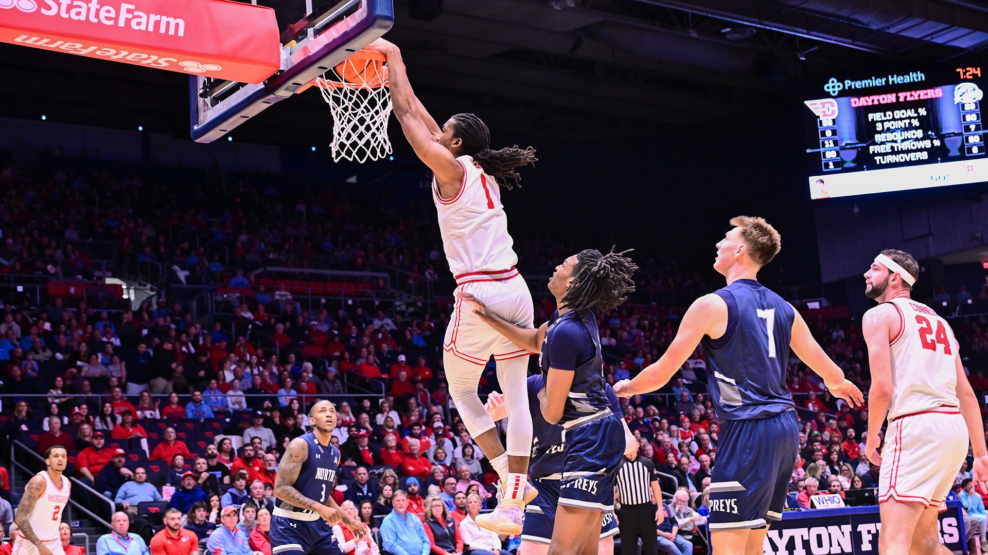 Dayton men's basketball player Malcolm Thomas dunks against North Florida.