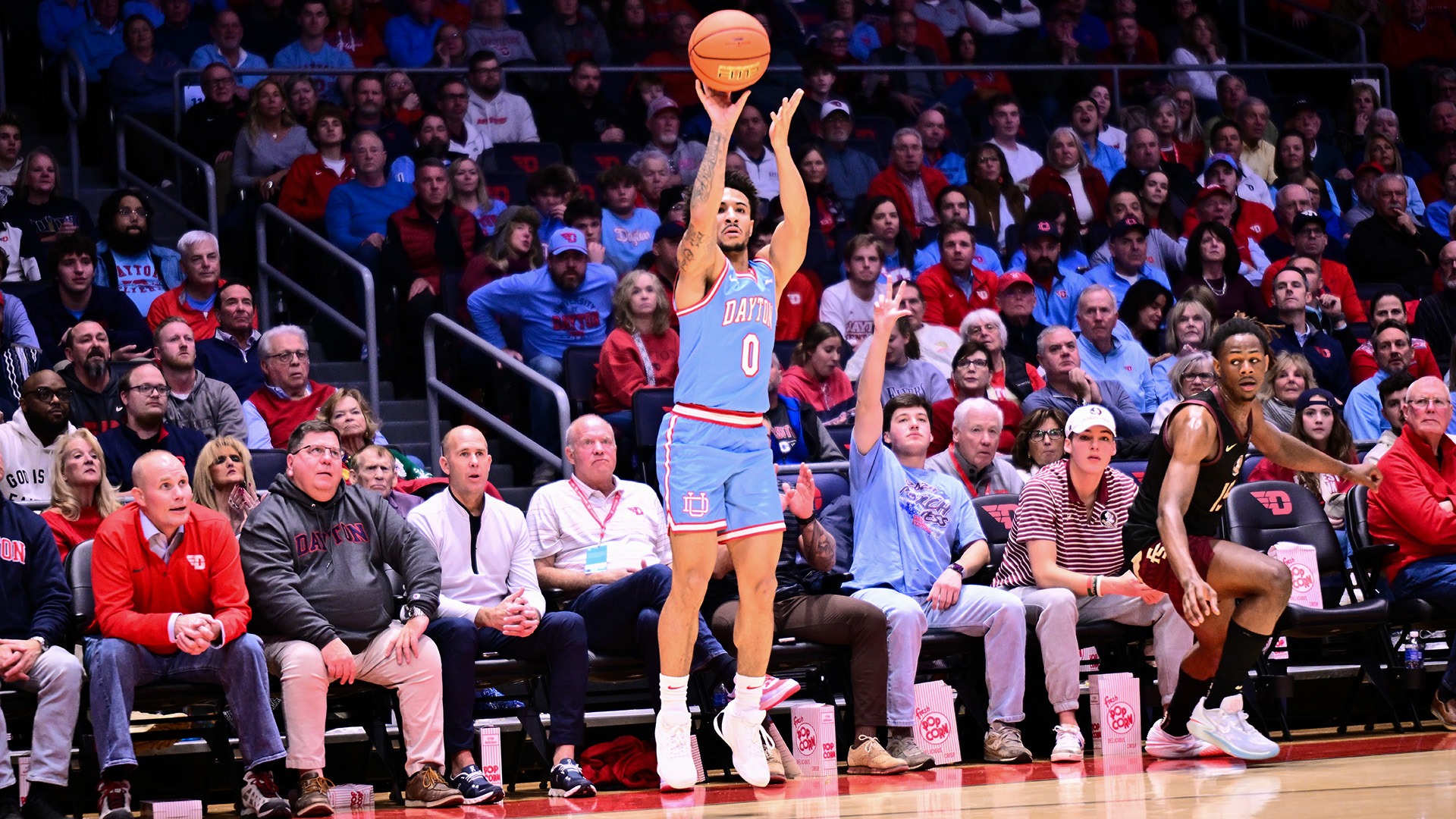 Dayton men's basketball player Javon Bennett knocks down a shot against Florida State.