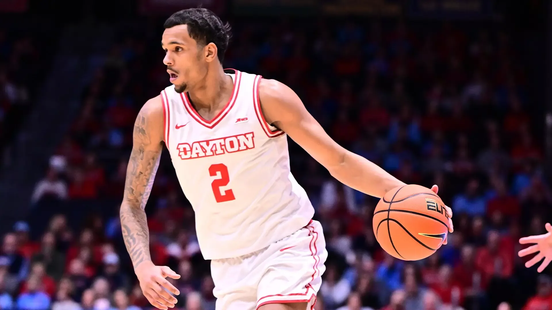 An action shot of Dayton's men's basketball player De'Shayne Montgomery 