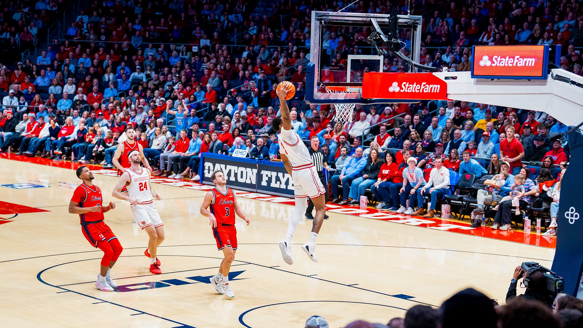 Dayton men's basketball player Keonte Jones goes up for a shot against Liberty in UD Arena.