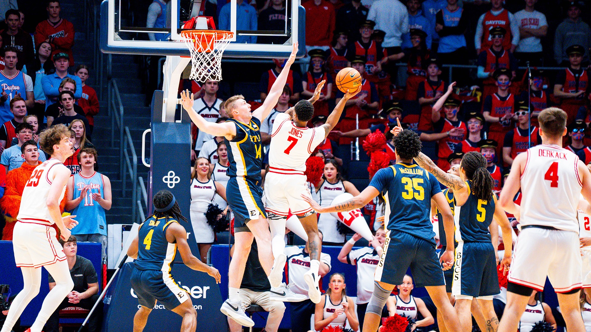 Dayton men's basketball player Keonte Jones finishes a right-hand layup against ETSU.