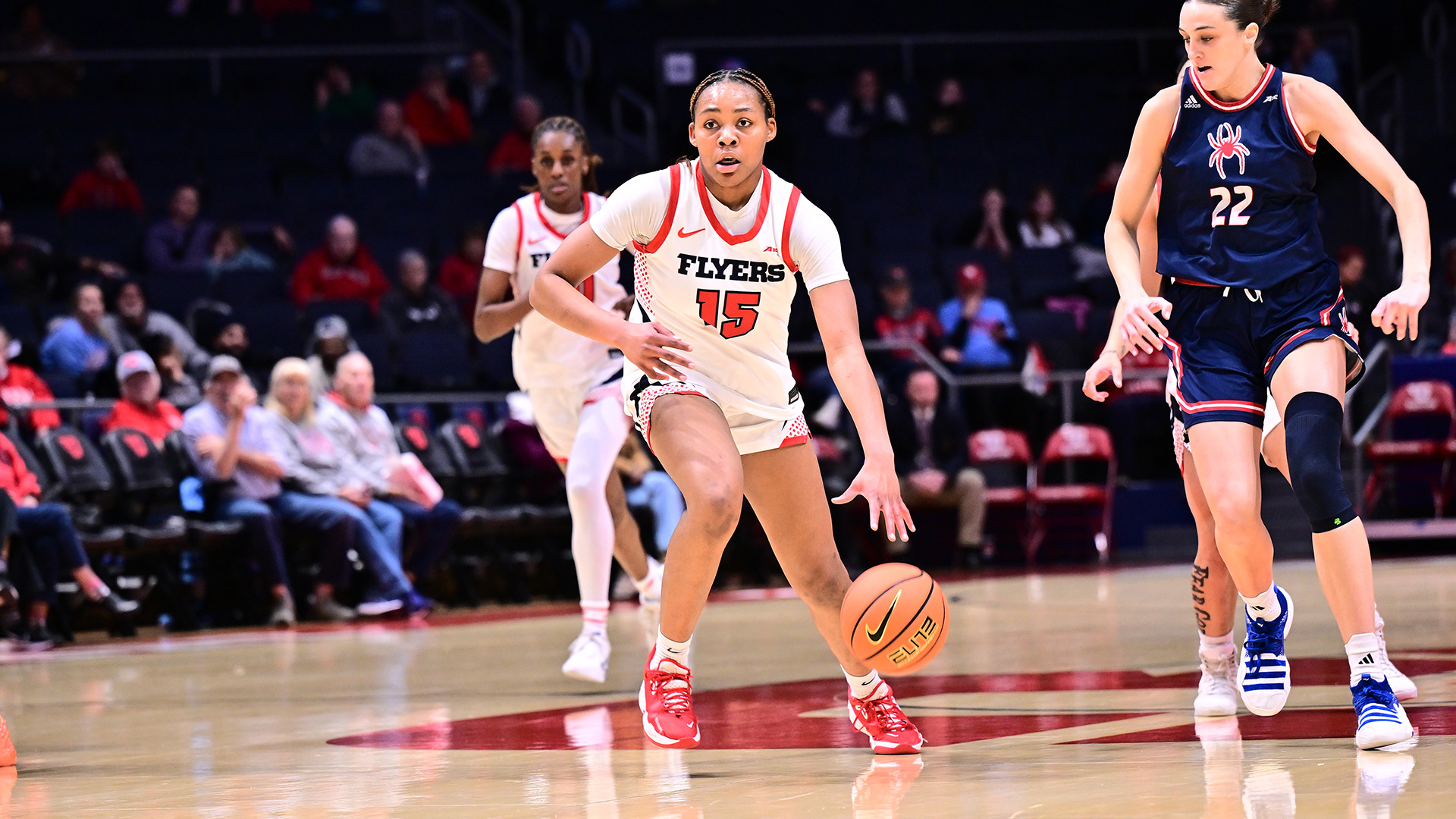 MG Talle dribbling past a defender