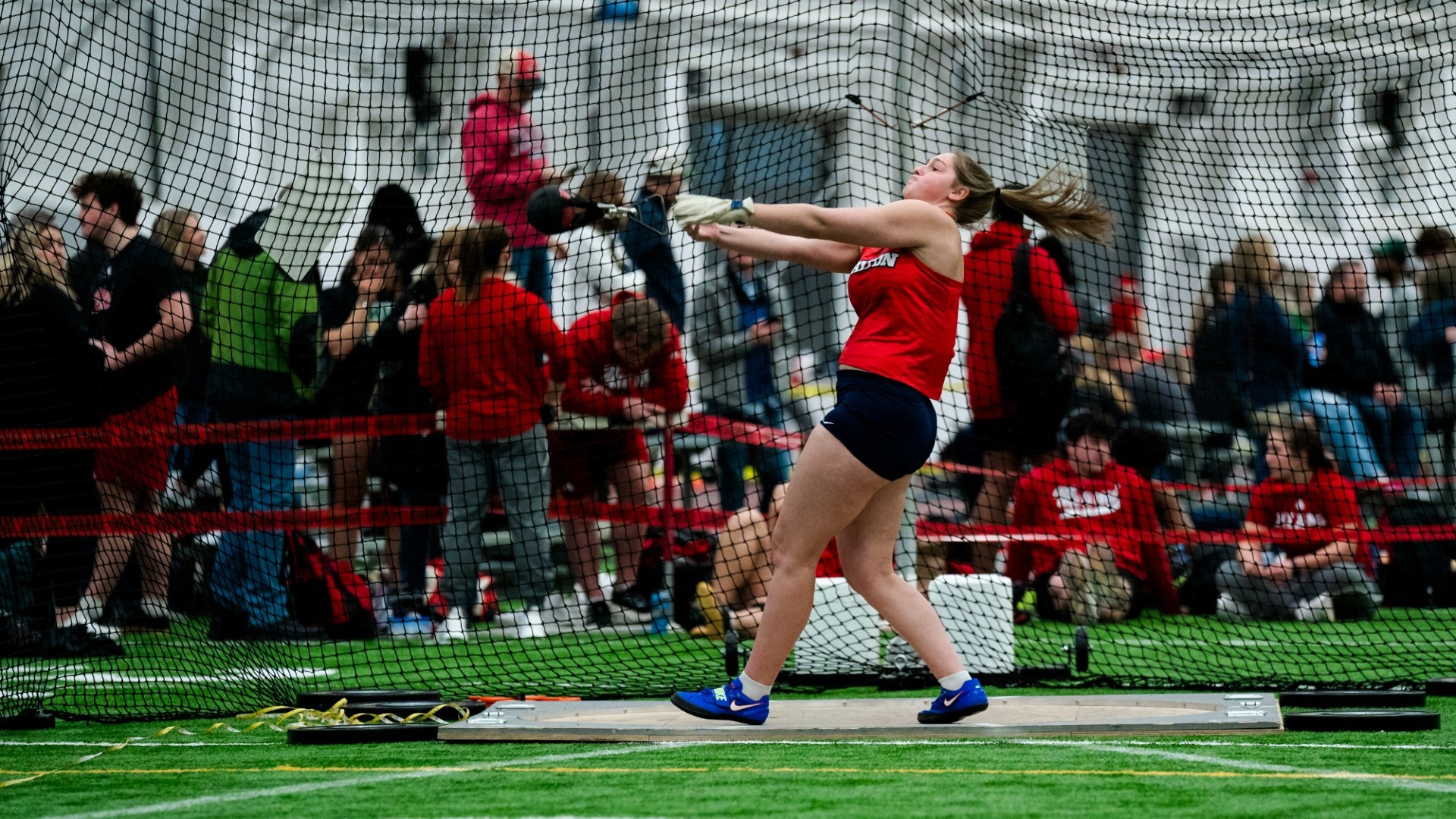 Anna Yater releases the weight in the weight throw event