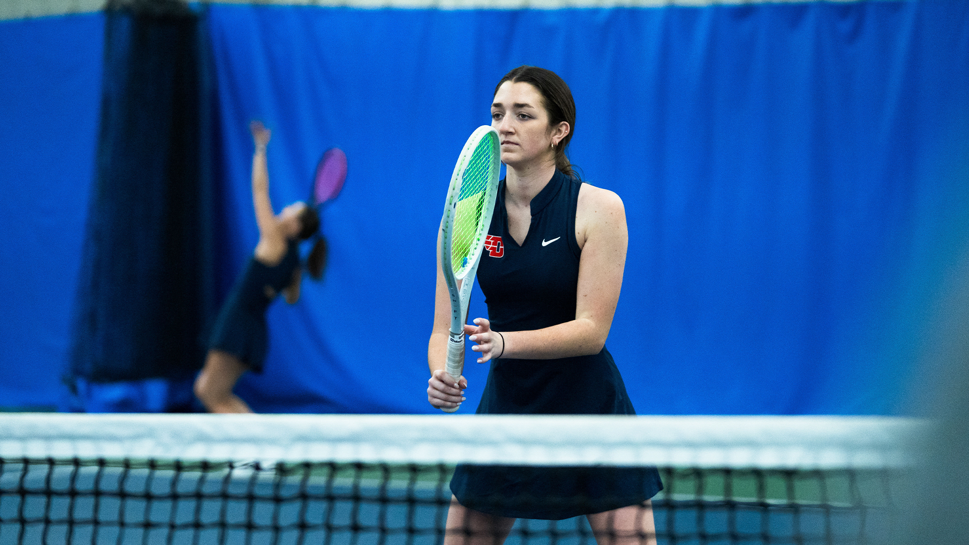 Haley Klein stands ready at the net.