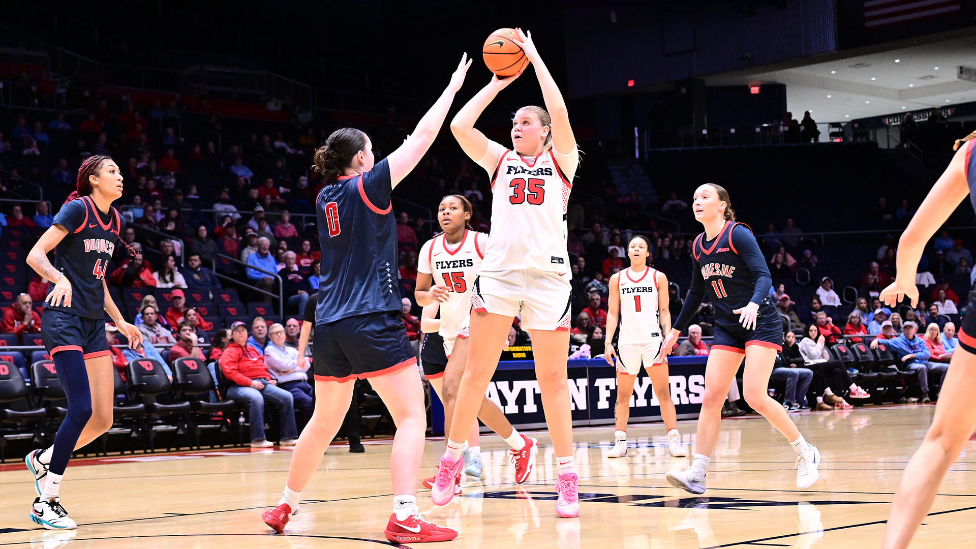Molly O'Riordan shooting over the defender