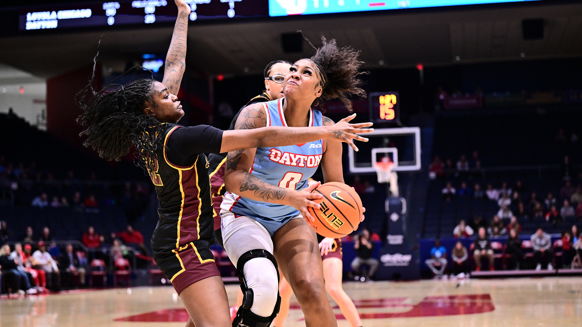 Maliyah Johnson going up to the basket
