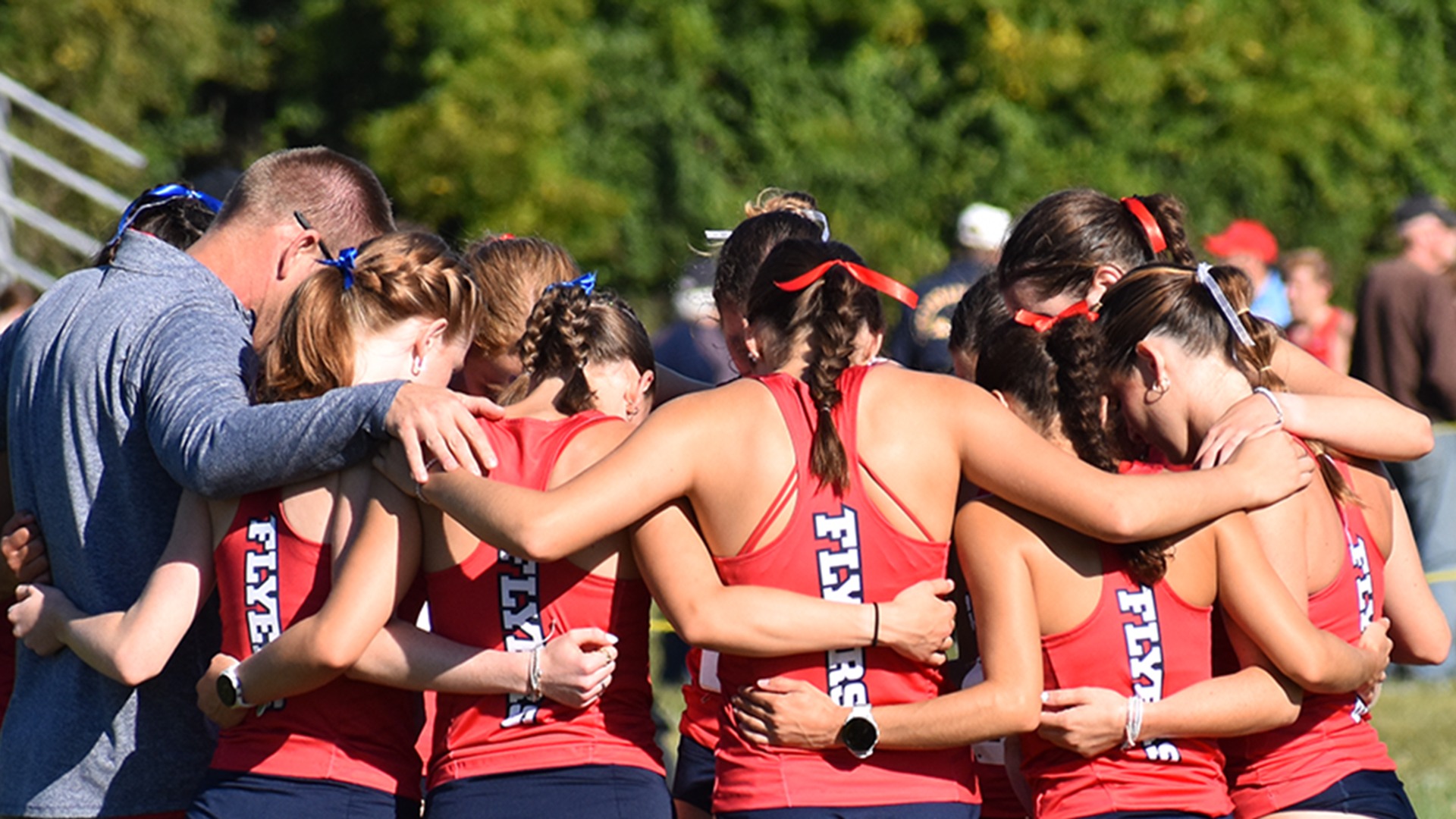 Women's Cross Country Team Huddle RedHawk Rumble 