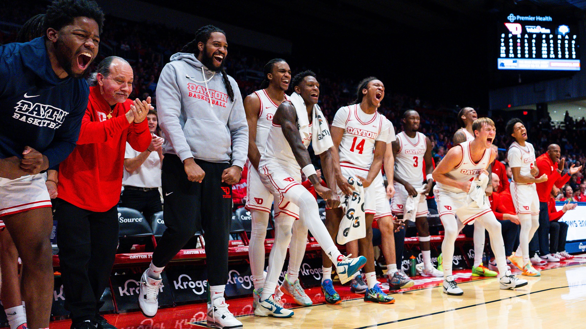 The Dayton men's basketball bench celebrates during the final exhibition of the 2026-27 season against Morehead State.