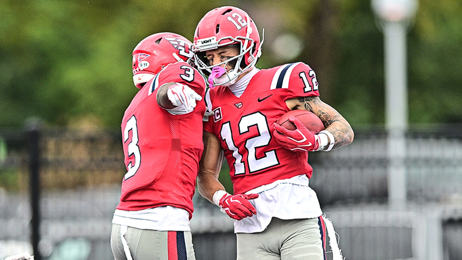 Leroy Lewis (3) and Gavin Lochow (12) celebrate a touchdown