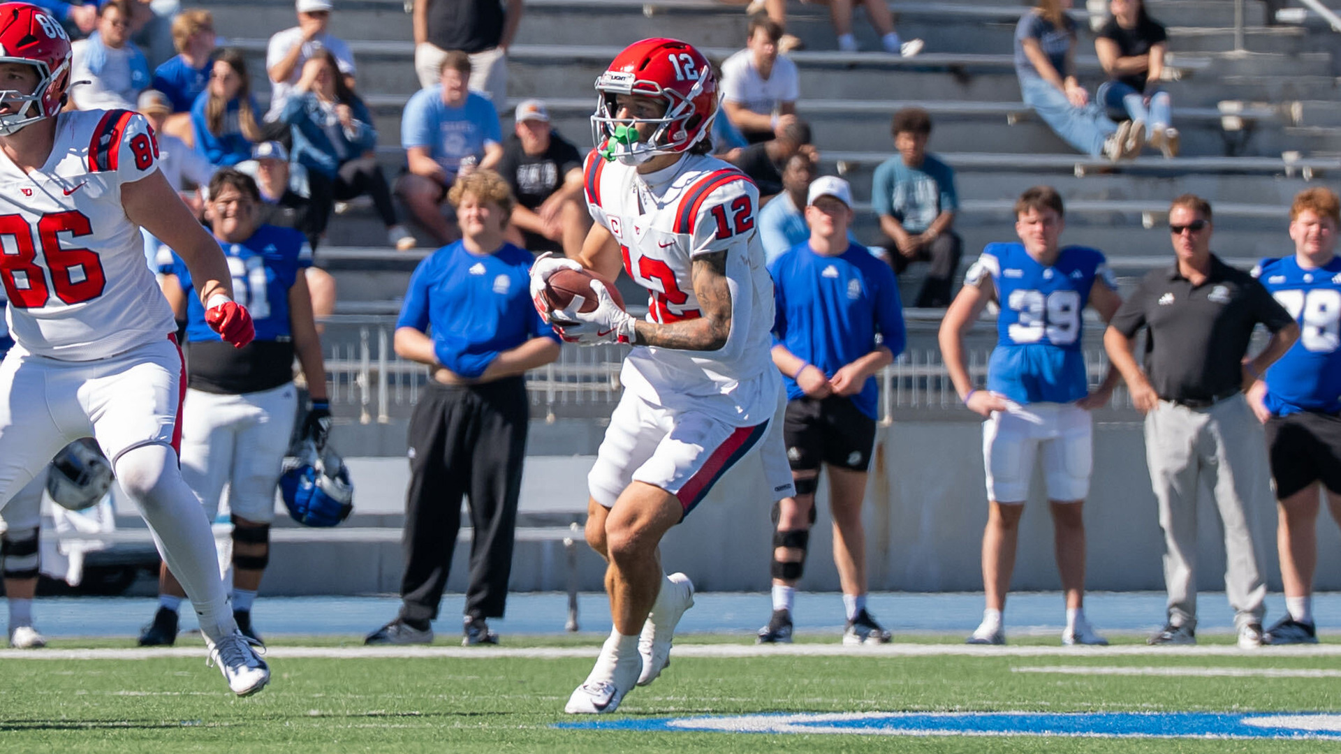 Gavin Lochow running with the ball at Drake