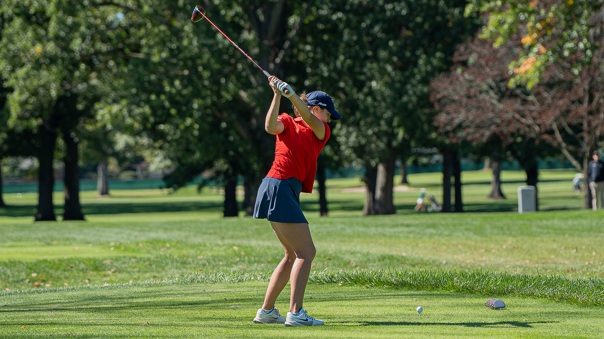 A women's golfer in her backswing