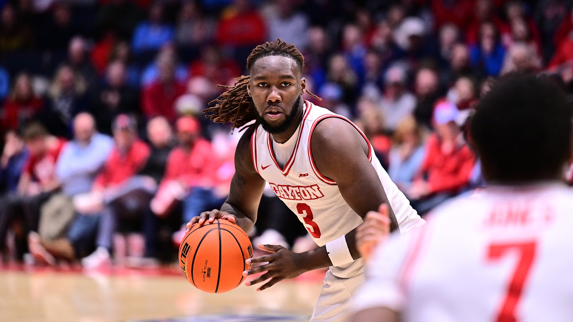 Dayton Men's Basketball player Jaiun Simon plays offense looking to pass the ball