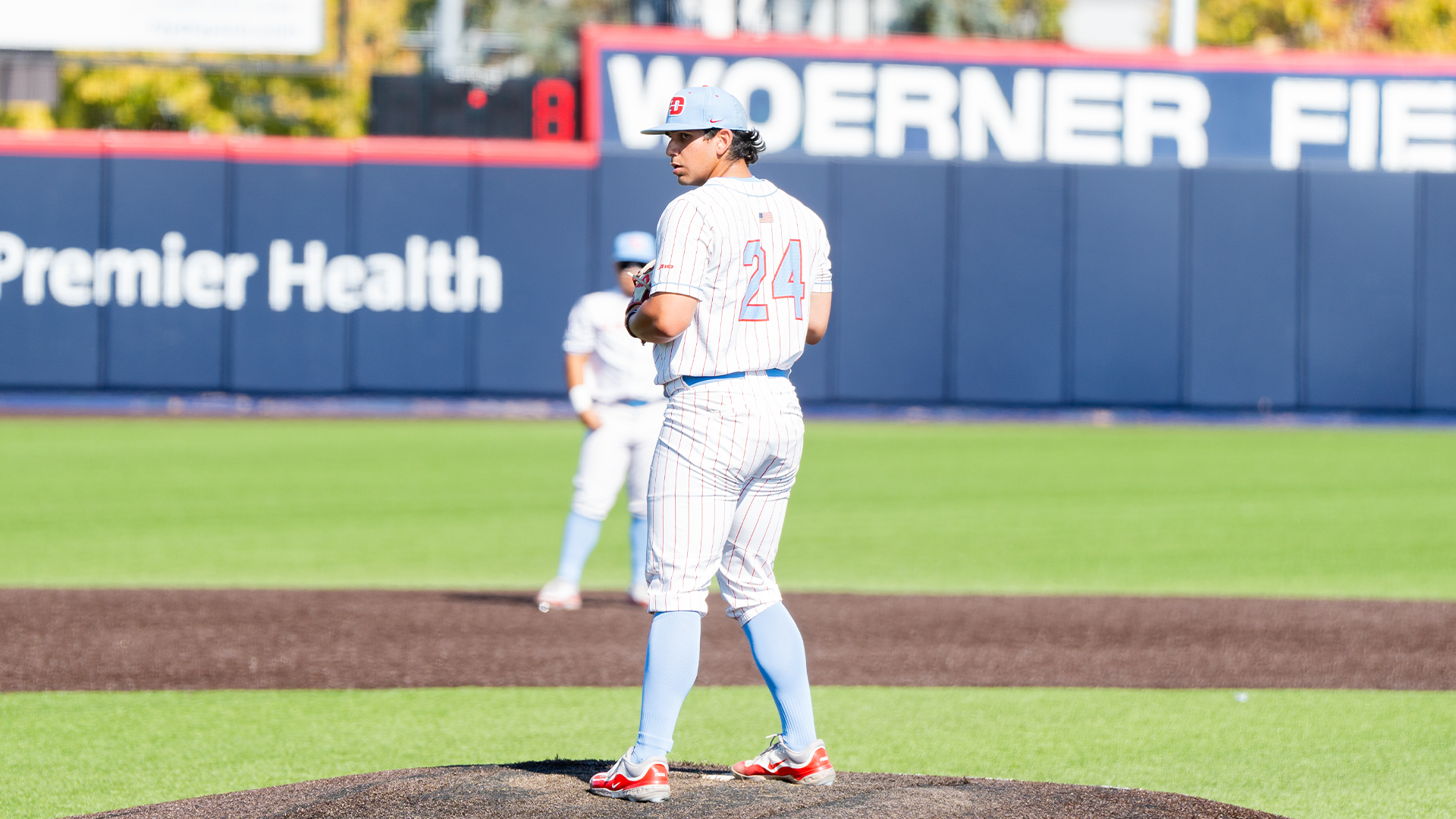 Michael Fortes stands on the mound, ready to pitch.