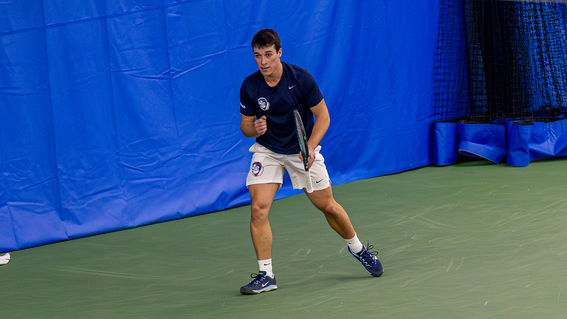 Mikkel Zinder pumps his fist in celebration after a point.