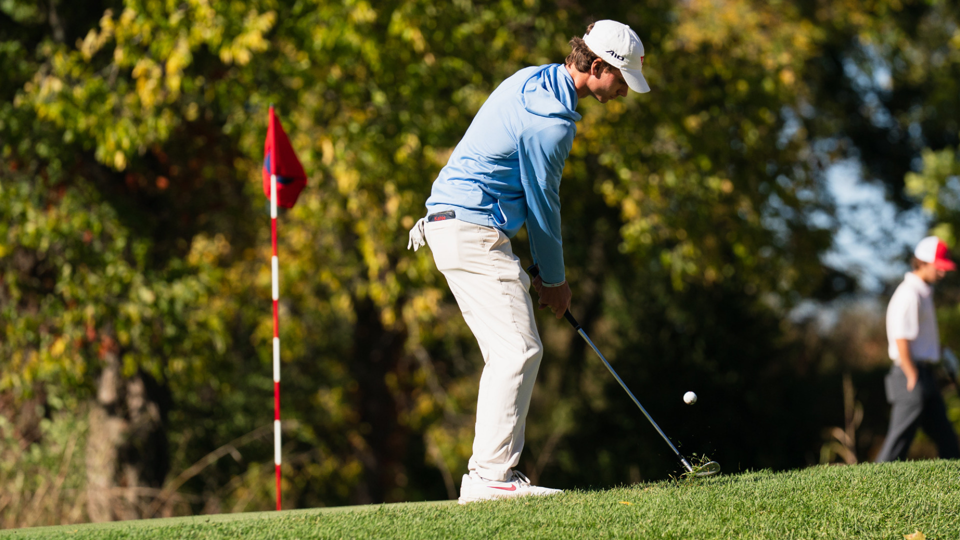 Men's golfer Luke Kahle chips onto the green during the UD's annual Dayton Flyer Invitational at NCR Country Club