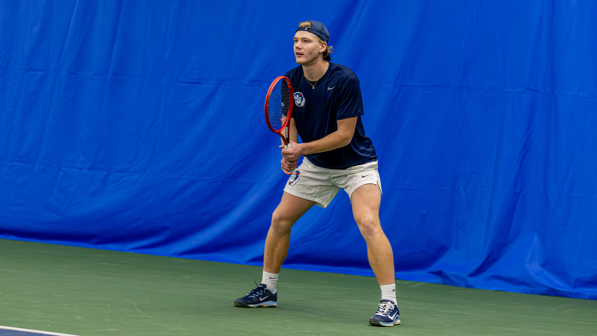 Sturle Skigelstrand stands ready for the serve.