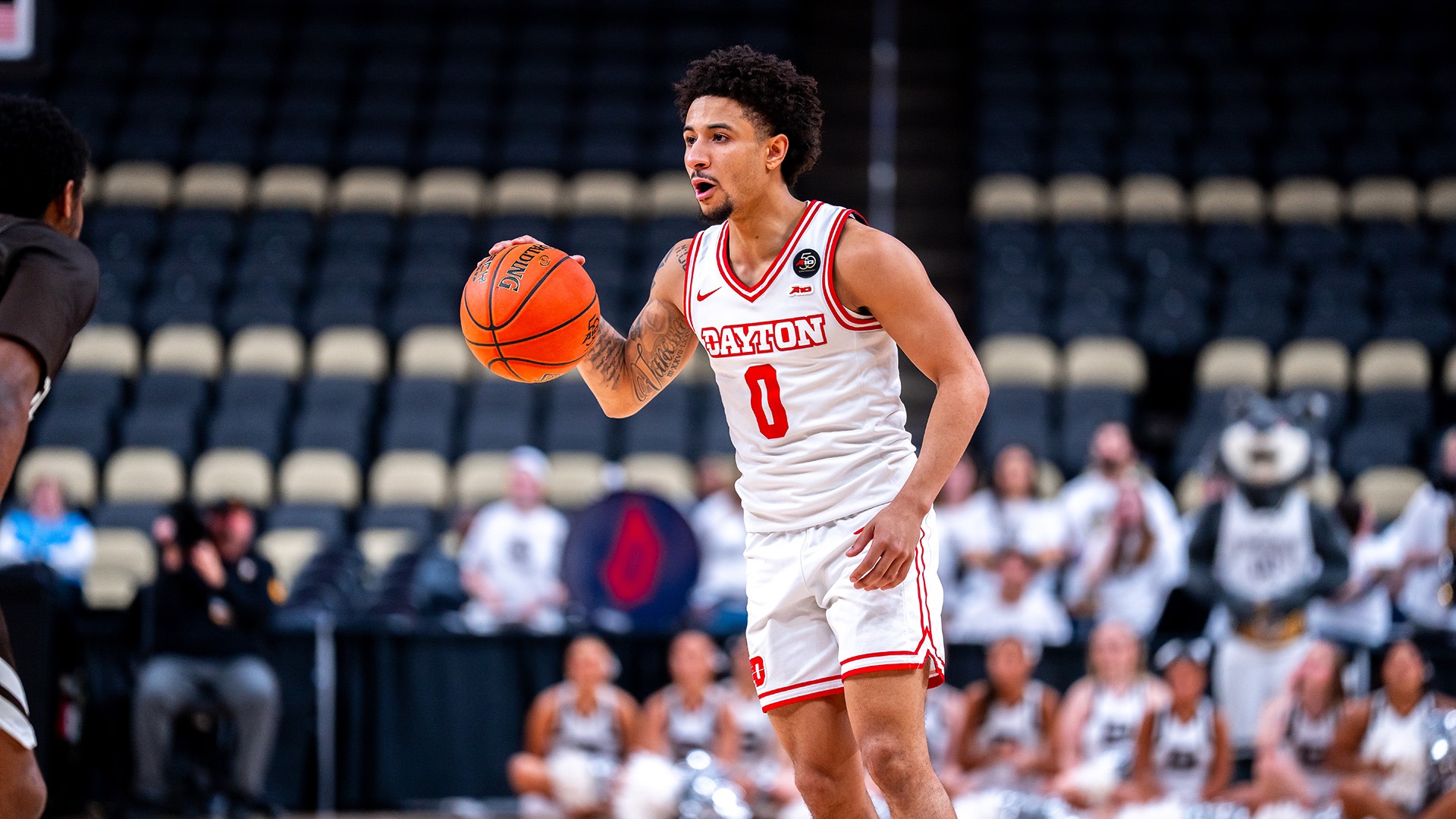 Dayton men's basketball player Javon Bennett commanding the offense against St. Bonaventure in the Atlantic 10 Tournament.