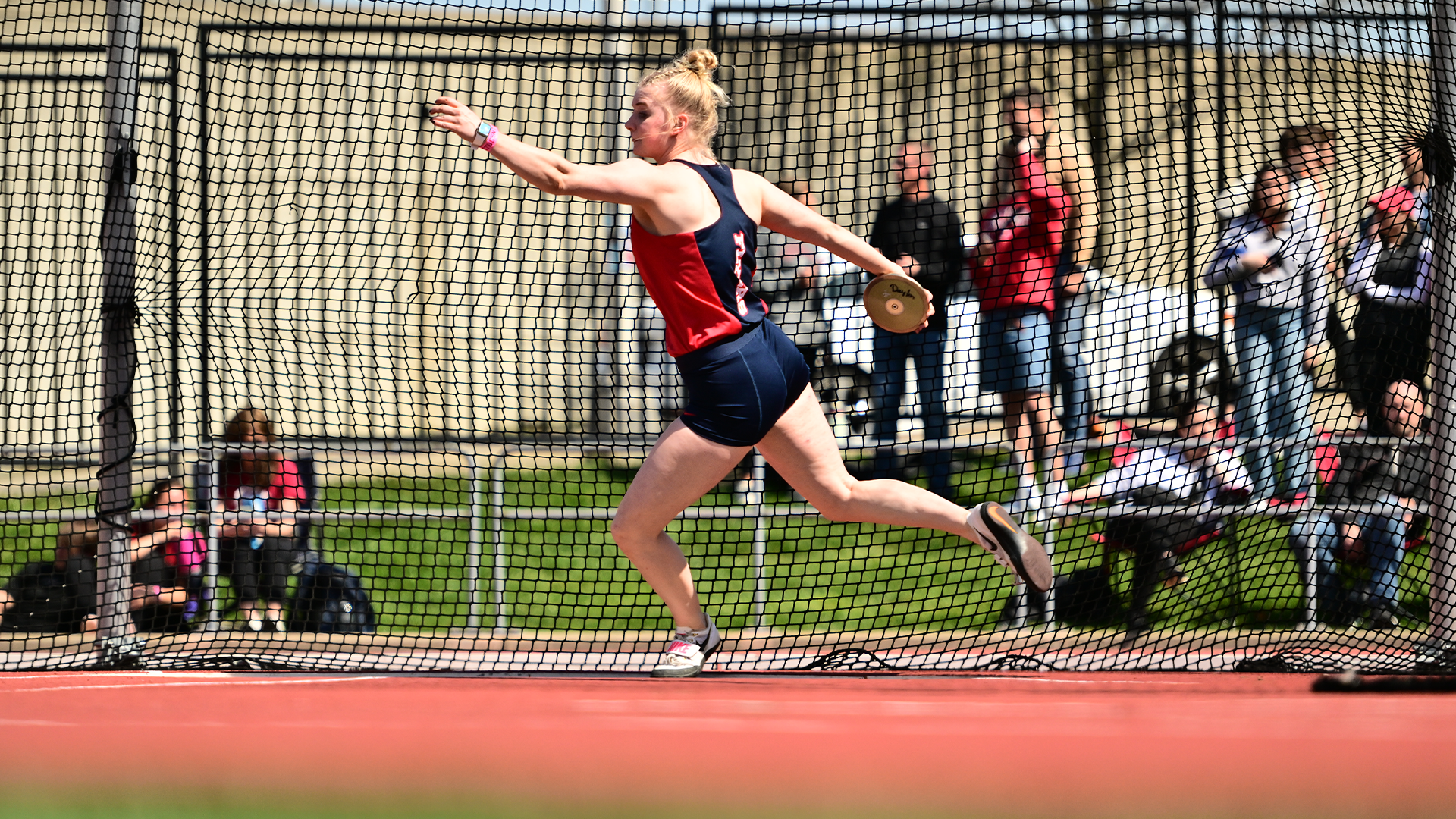 Maggie Hofner winds up to throw a discus