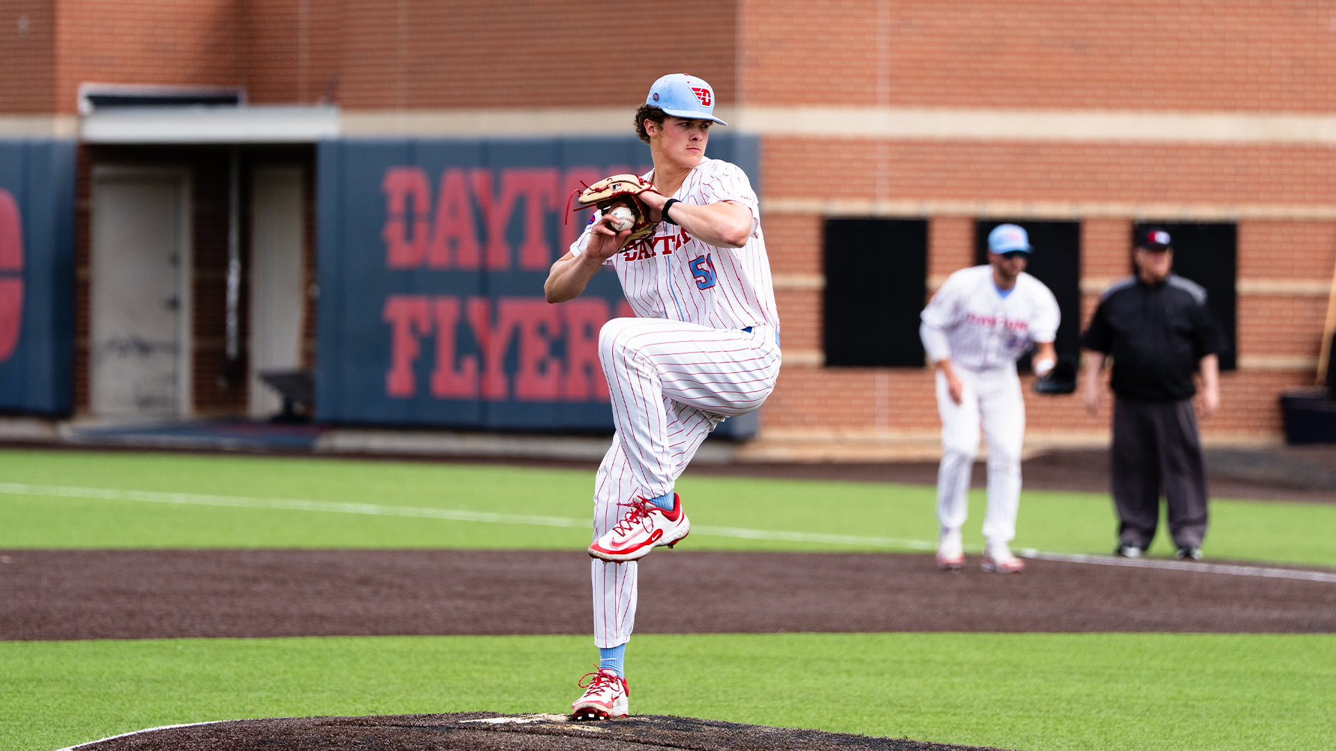 Sawyer Jensen winds up and begins to pitch.