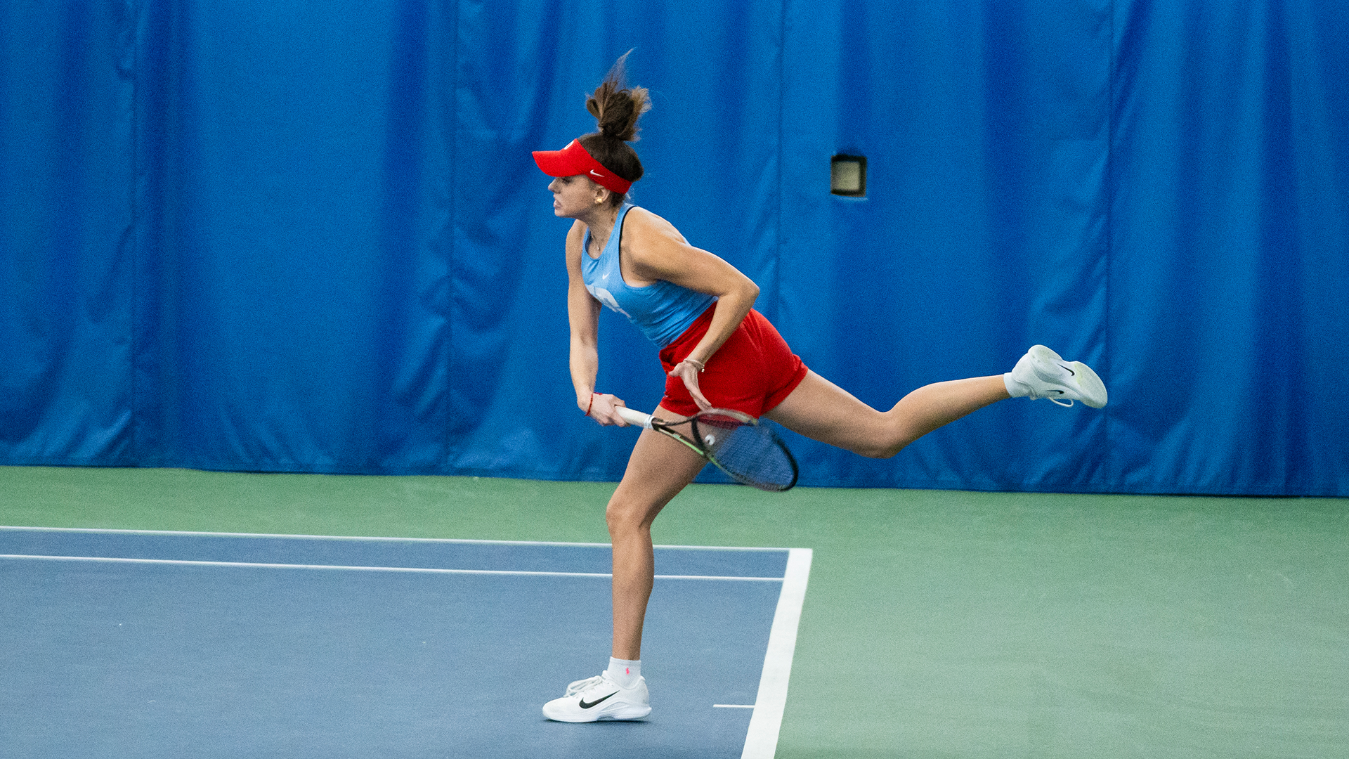 Monserrat Sierra follows through her swing.
