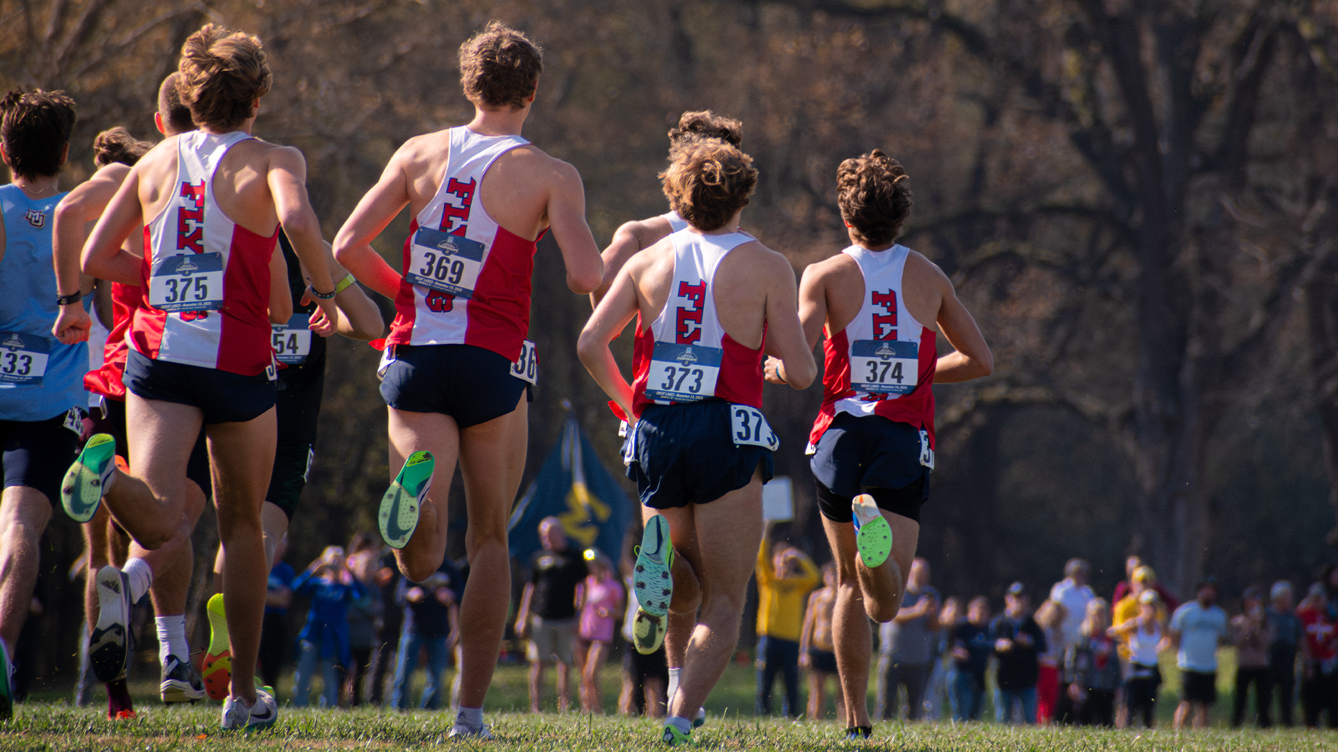 UDXC men warm up before the NCAA Great Lakes Regional