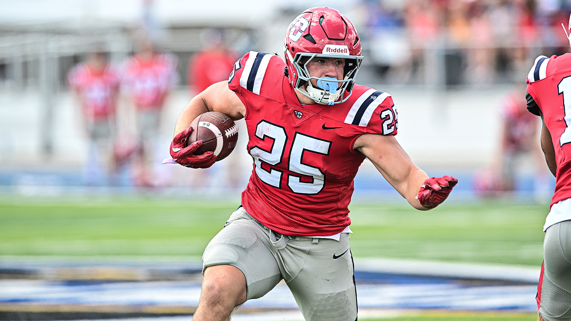 Luke Hansen carrying the ball