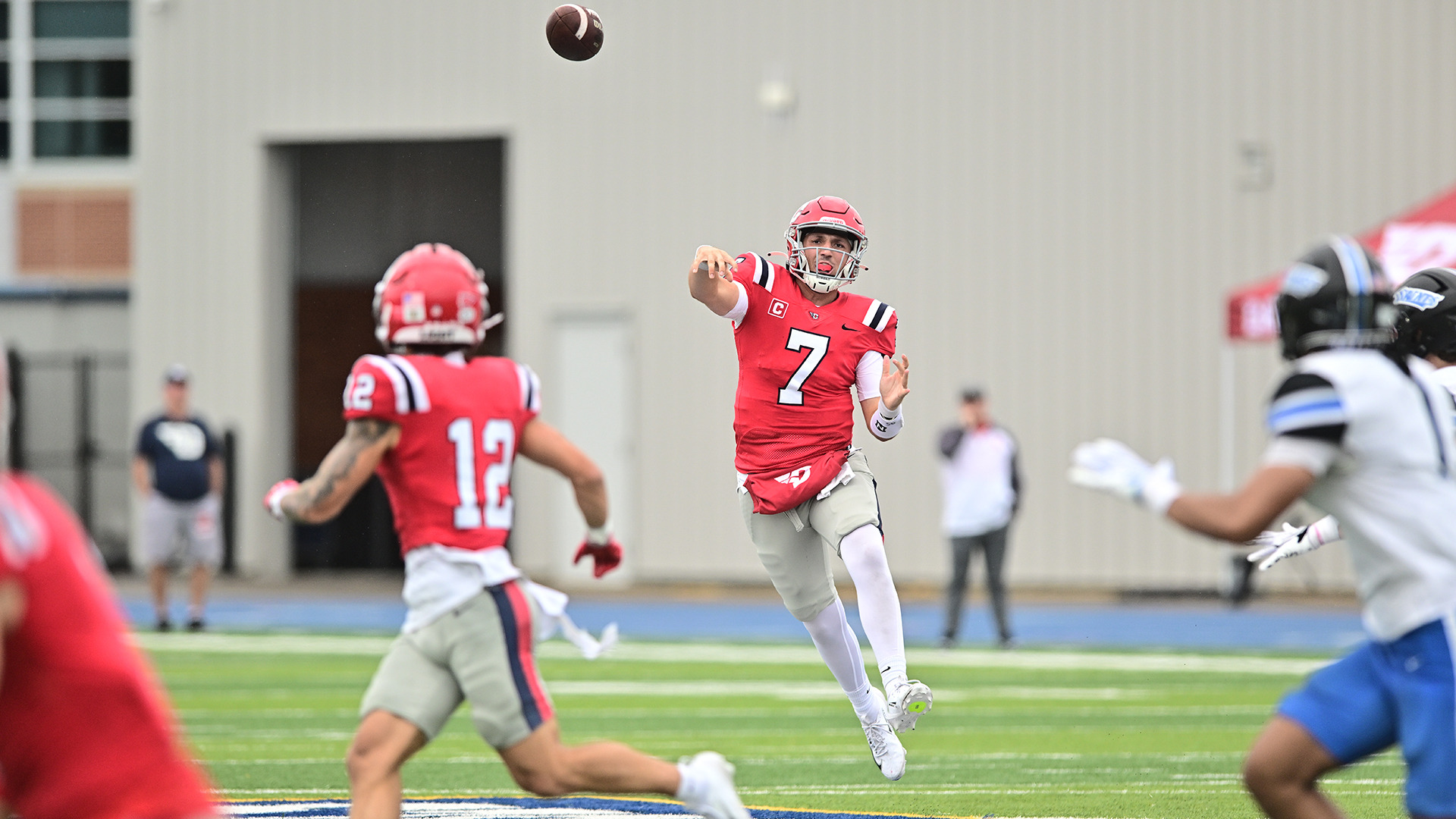 Bryce Schondelmyer throwing a pass 