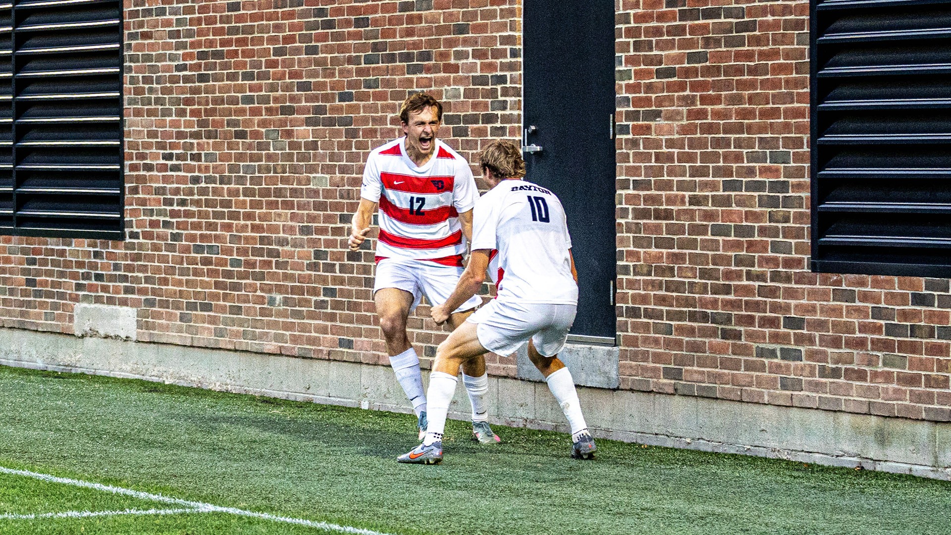 Lijewski and Seel celebrate after Lijewski's goal.