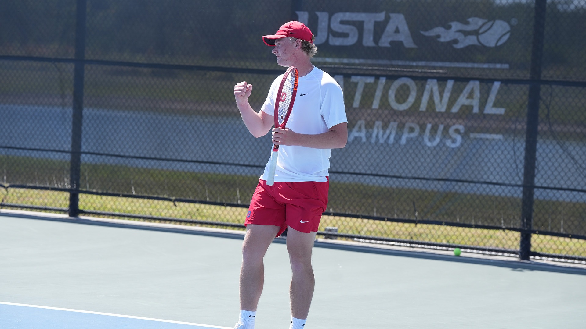 Skigelstand pumps his fist in celebration after a point.