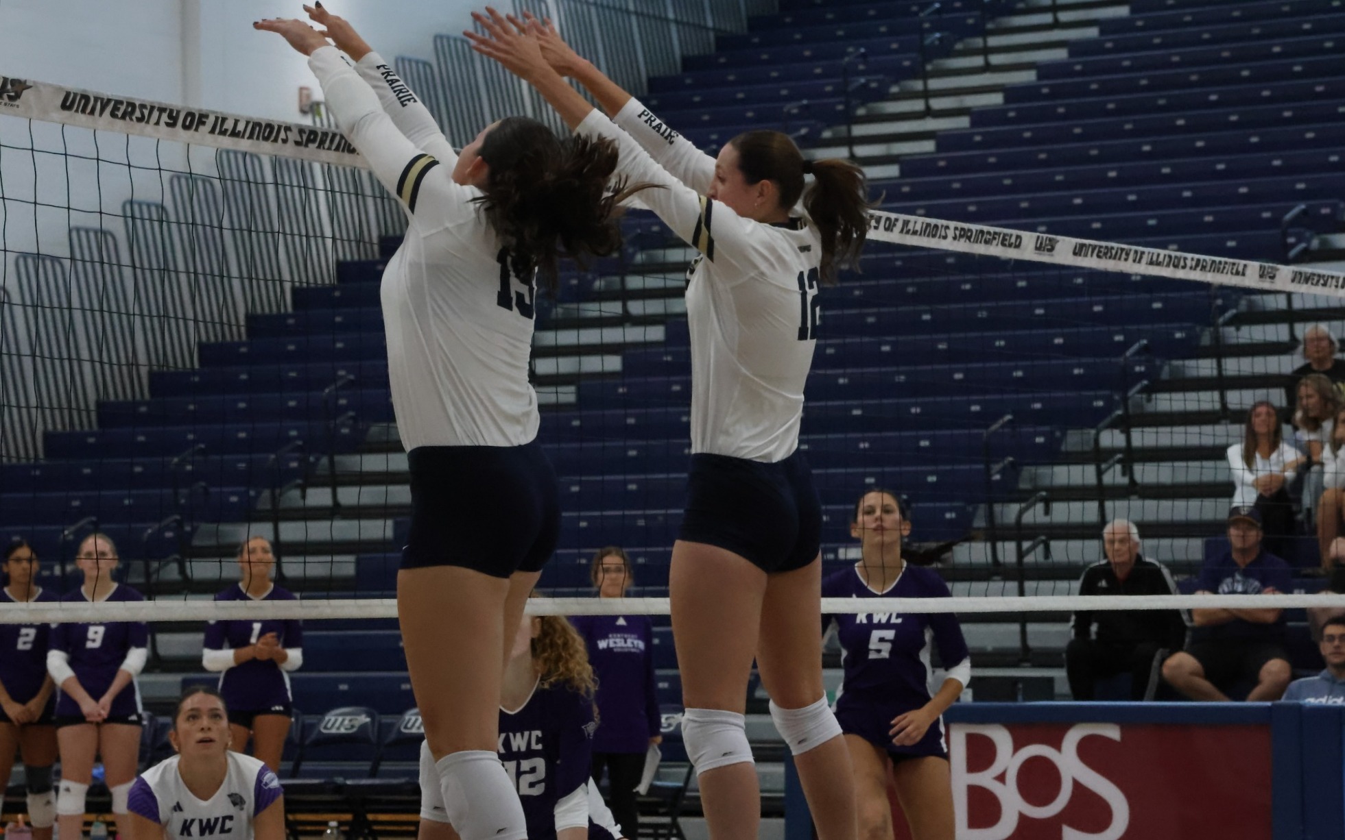 Makenna Cox and Lexie Vick block at the net