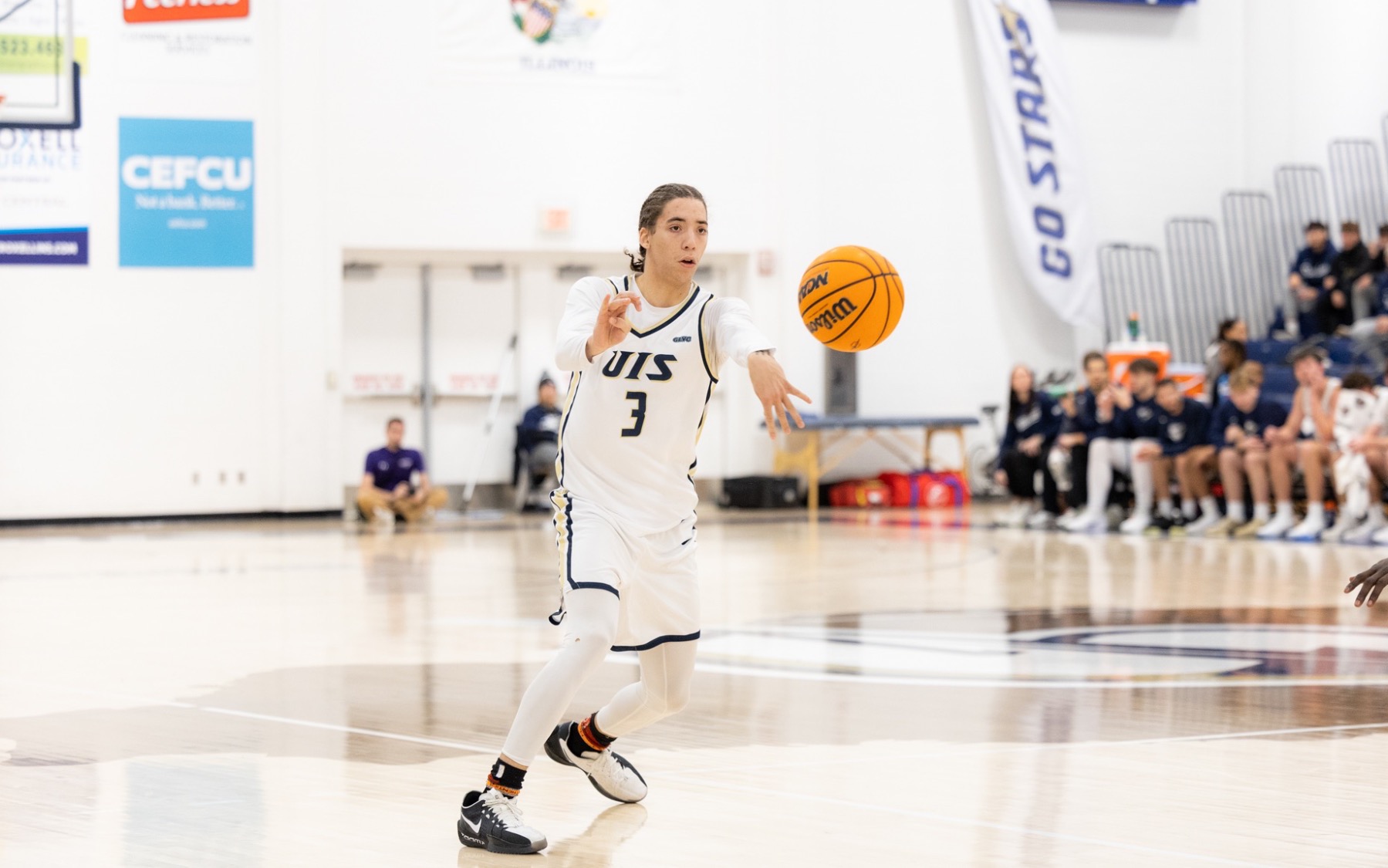 Adidas Davis playing basketball at UIS