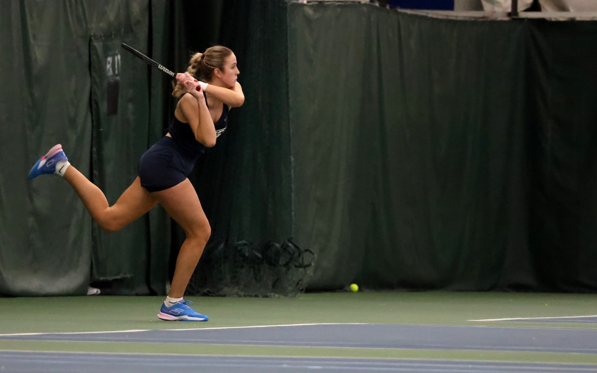 Niamh Grogan playing singles