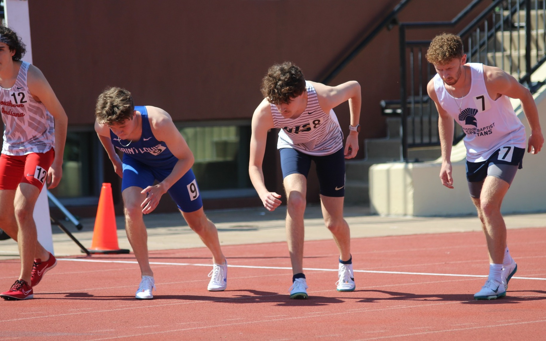Lucas Naugle on starting line in outdoor track