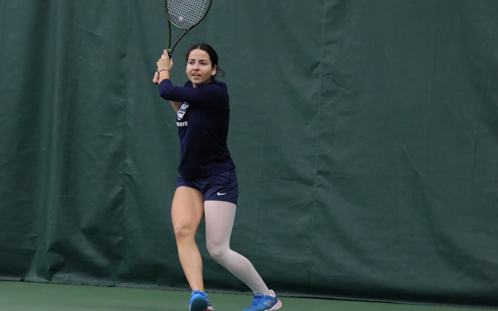 Carmen Llopis Fabra playing tennis