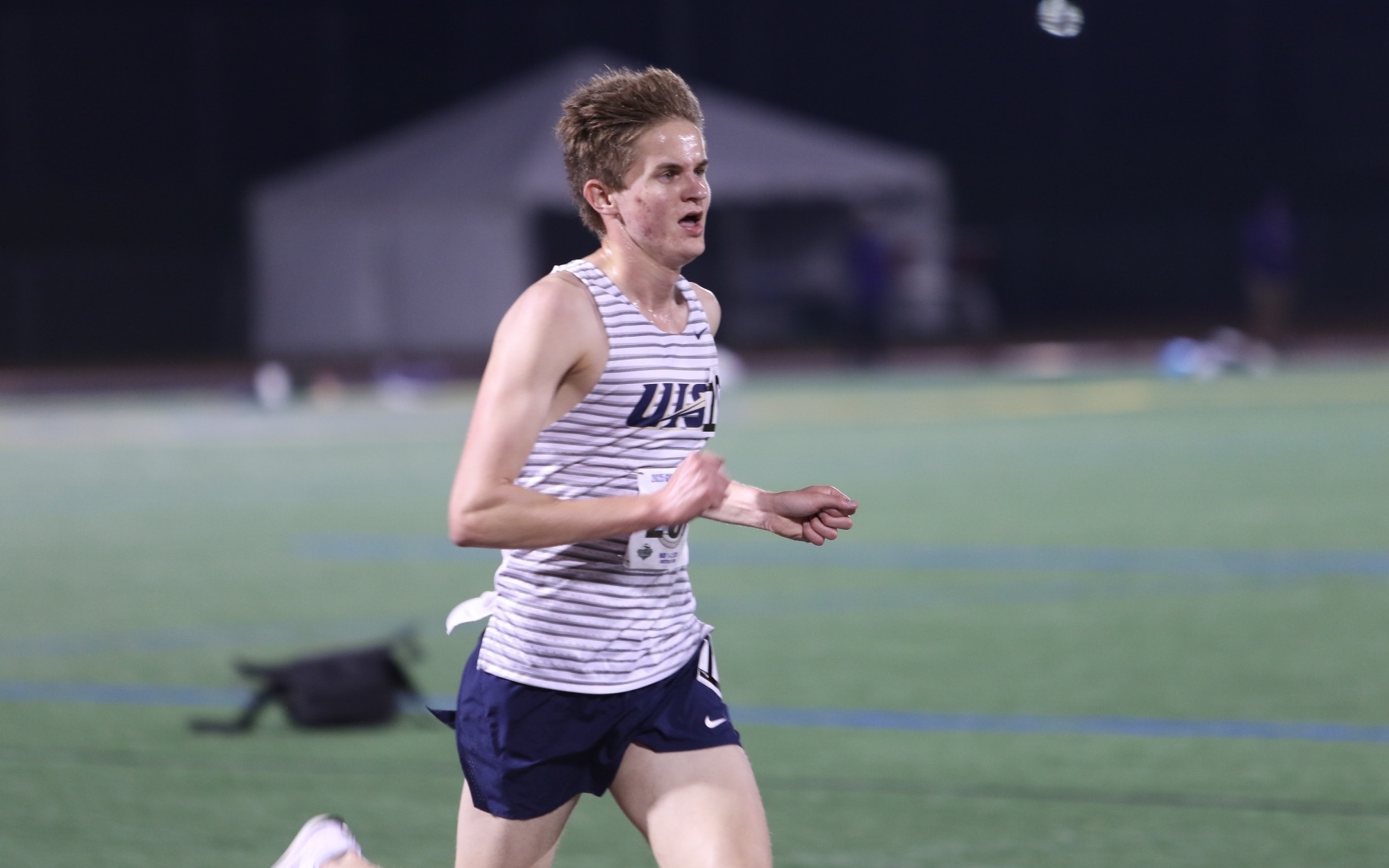 Ryan Kris running outdoor track