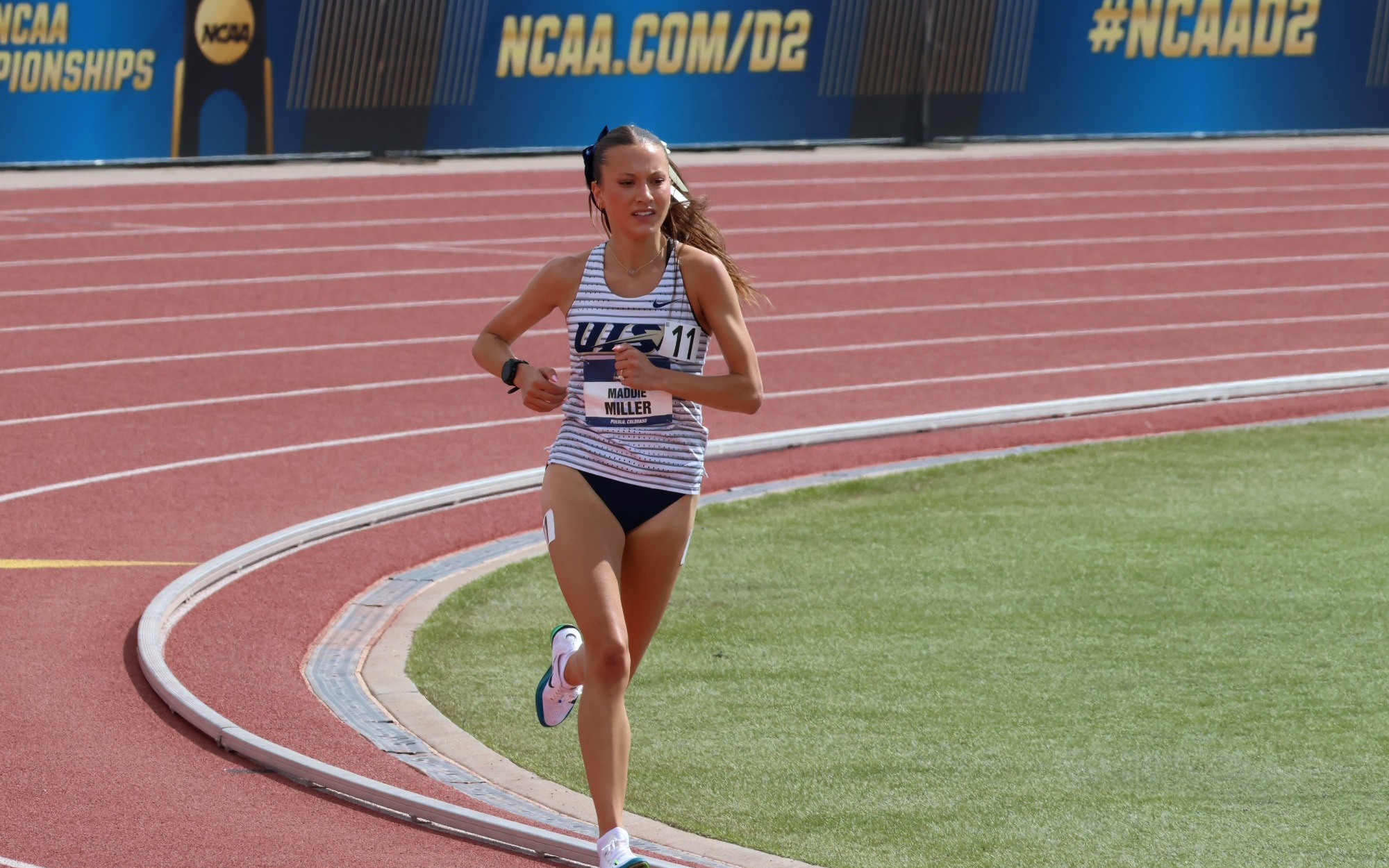 Maddie Miller running outdoor track